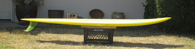 Sideview of 1977 Pineapple Hawaii-Sunset Short Gun Vintage Surfboard